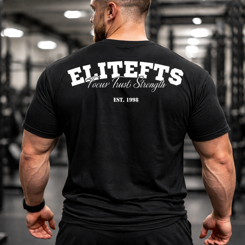 Person wearing a black 'ELITEFTS' t-shirt in a gym setting-all-groups