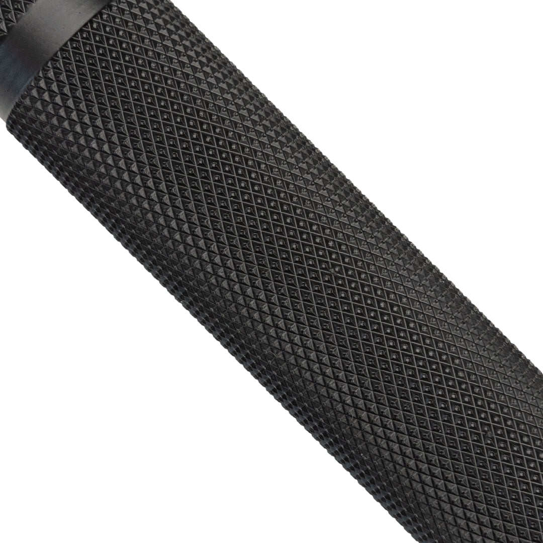 Close-up of a textured black bar on a white background